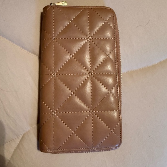 Charming Charlie Handbags - Charming Charlie quilted tan wallet